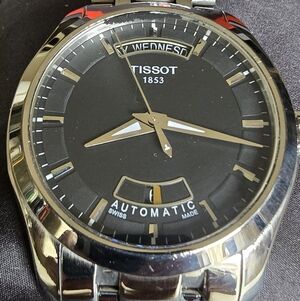 Tissot Classic Black and Silver Timepiece